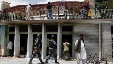 Twenty dead in Taliban siege of Afghan hotel; NATO blames Haqqanis 
