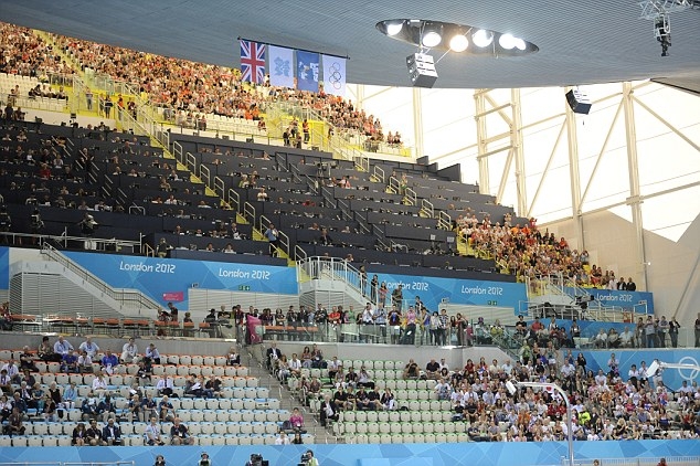 Olympic seating: Day one of the Games sees banks of empty seats at key venues  