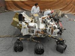 Mars rover Curiosity to explore intriguing giant crater 