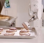 Burger-flipping robot begins first shift