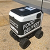 As food delivery robots invade campuses, students adjust to life with AI