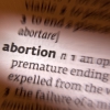 This Catholic college’s health insurance plan covers abortion. Does it violate church teaching?